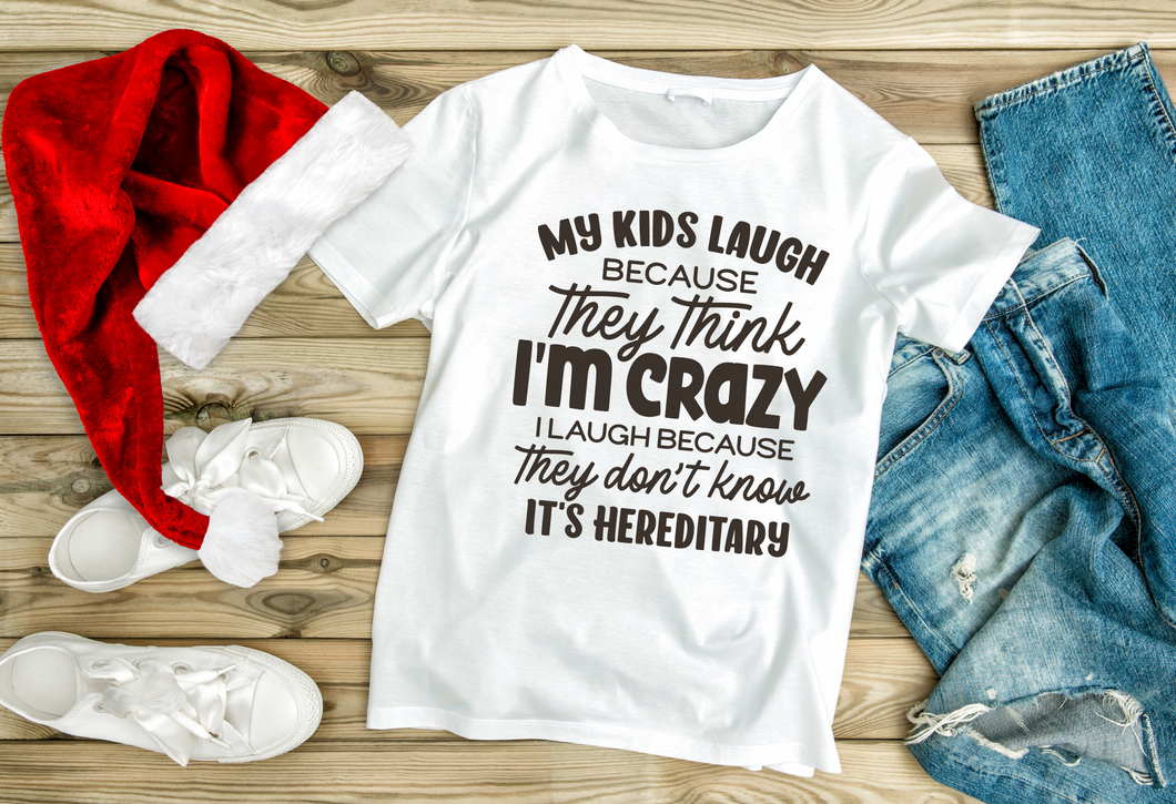 My kids laugh because they think I'm crazy I laugh because they don't know it's hereditary. Funny premium Unisex Crewneck T-shirt